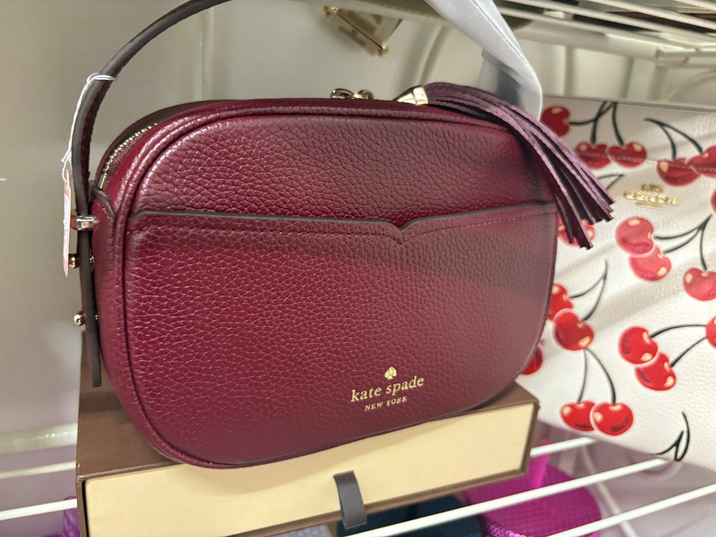 Maroon Kate Spade Crossbody tassel